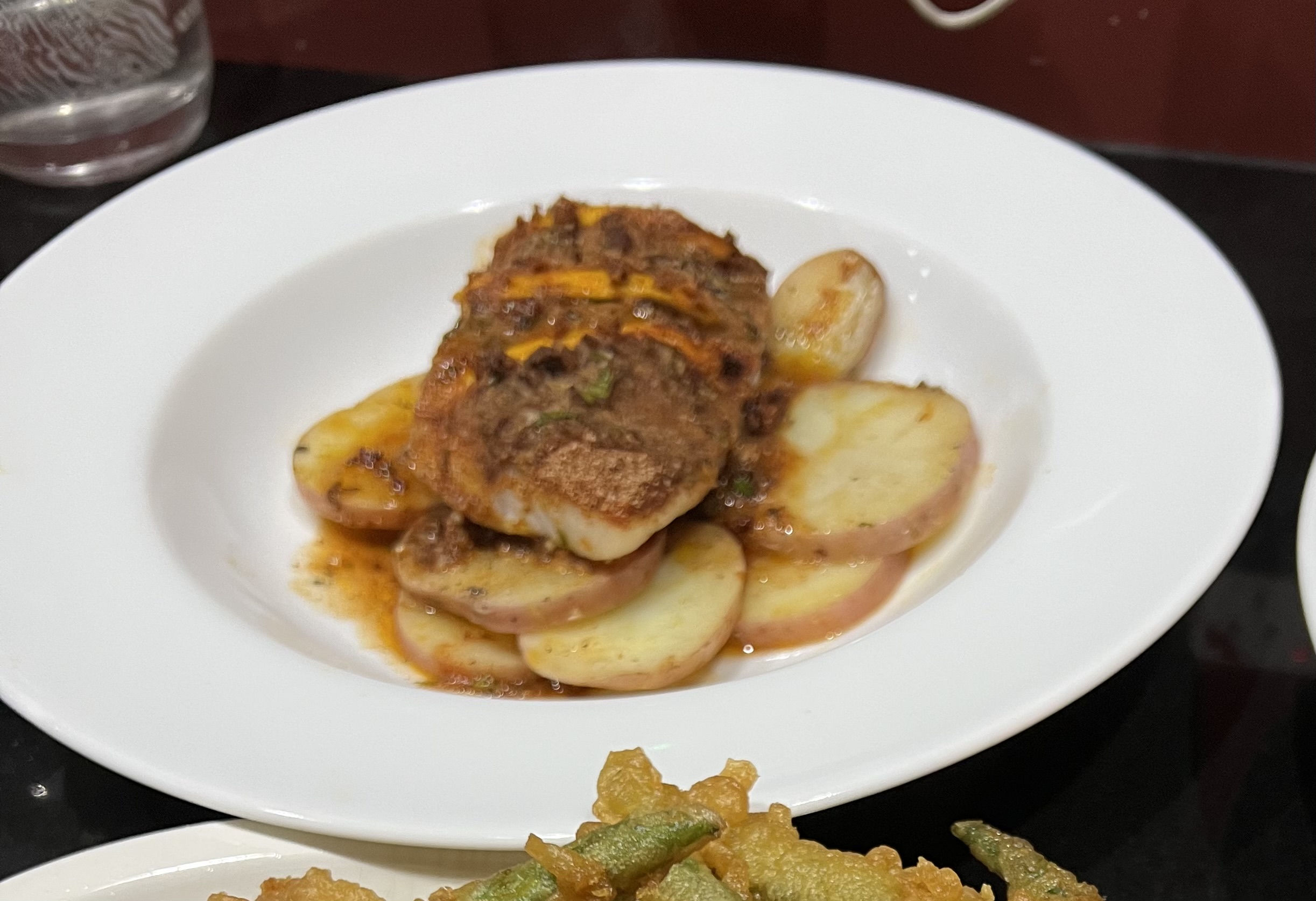 Red snapper baked with potatoes (Besugo al&nbsp;horno)