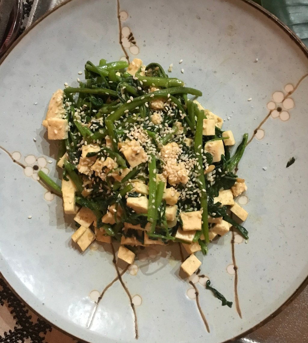 Wok-tossed water spinach with fermented bean curd sauce (Rau muông xào&nbsp;chao)