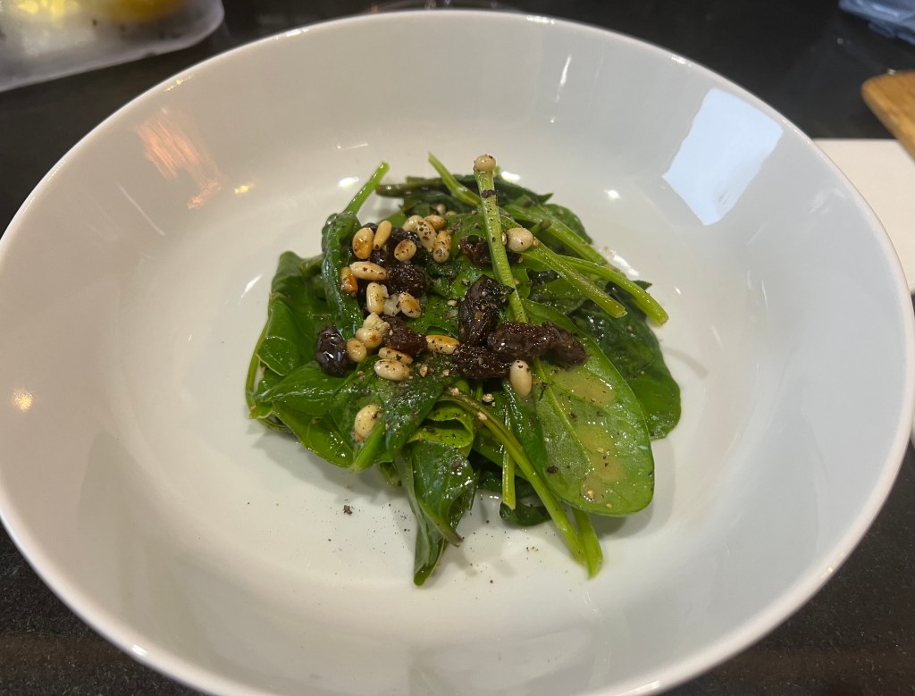 Spinaci con pinoli e&nbsp;uvetta