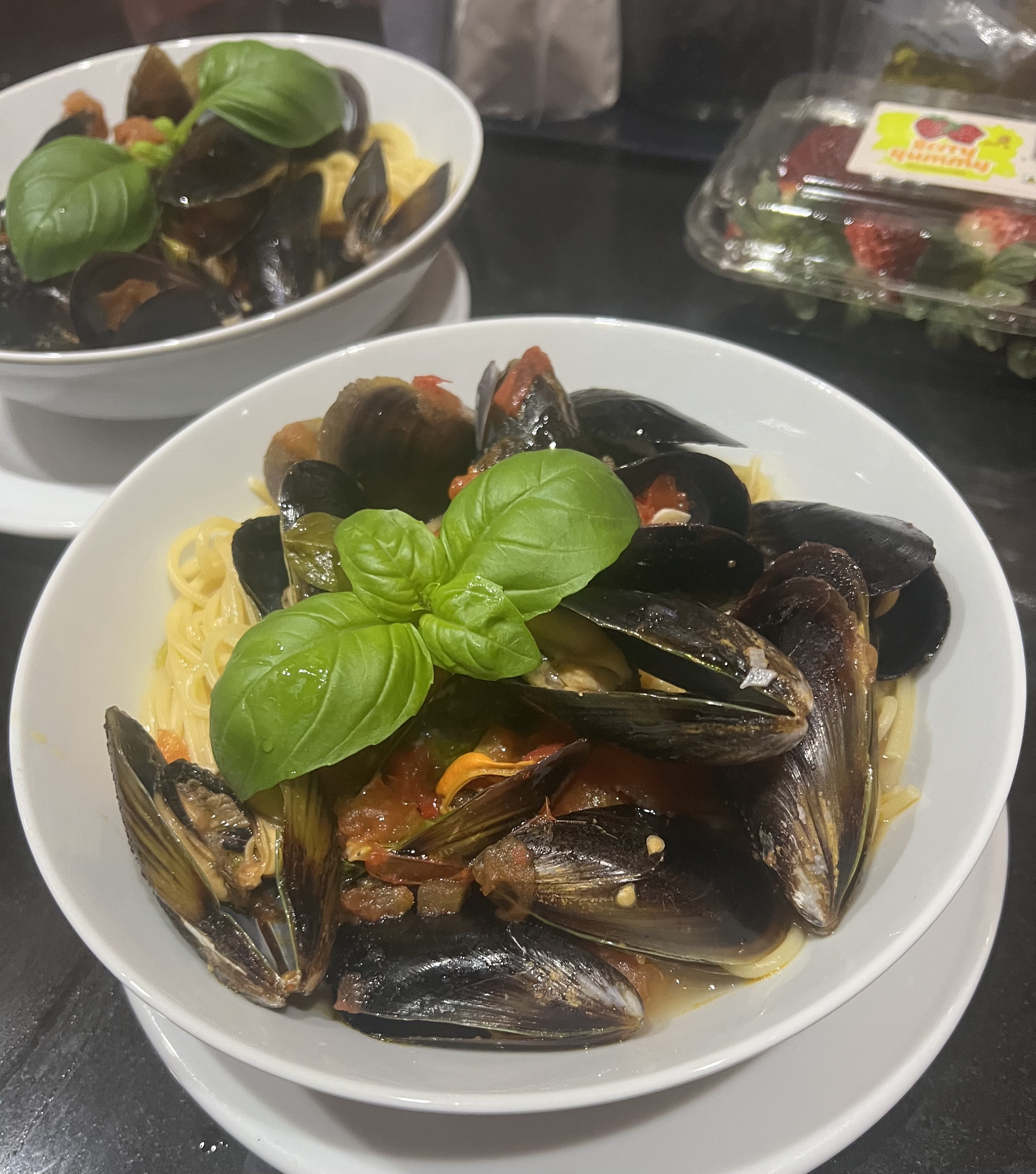 Spaghetti with mussels, tomato and chilli