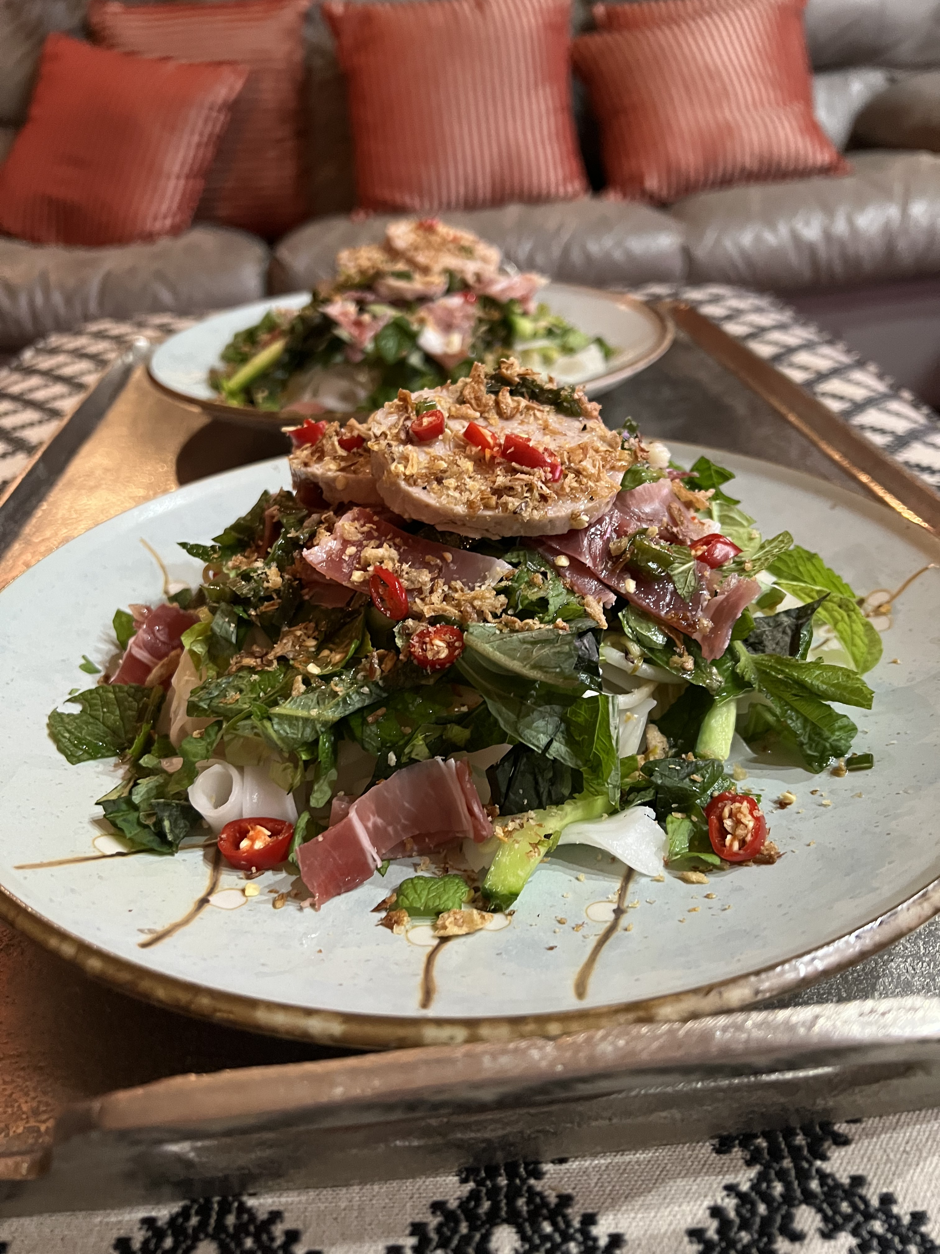 Steamed rice noodles with pork terrine and cured pork (Bánh cuôn cha lua nem&nbsp;chua)