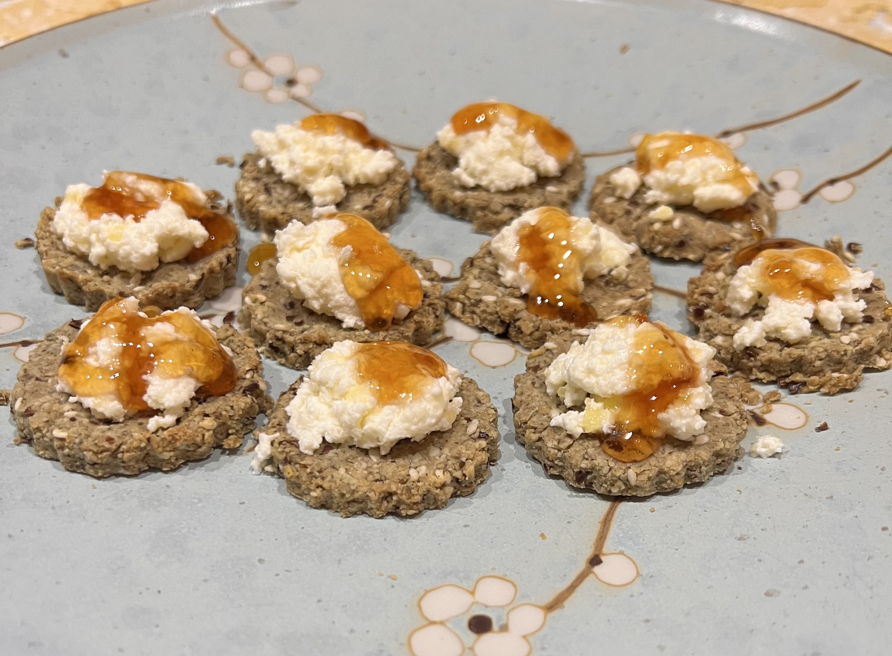 Homemade ricotta with seed crackers and&nbsp;honey