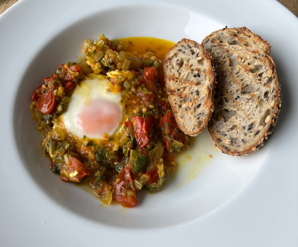 *Eggs poached on tomato (Tamatar kothmir per&nbsp;eeda)