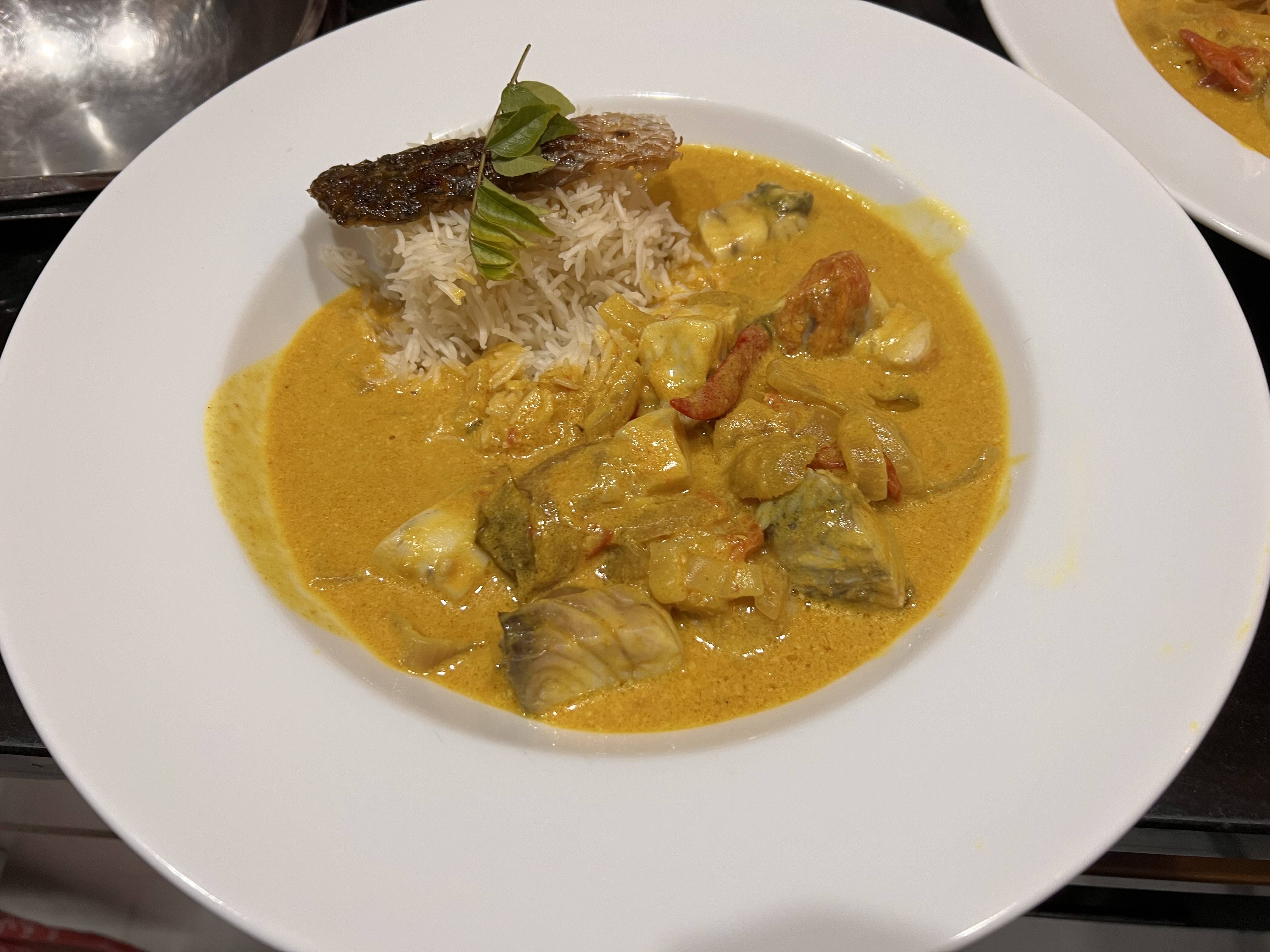 Sri Lankan fish mouli (Barramundi poached in coconut cream &&nbsp;lemongrass)