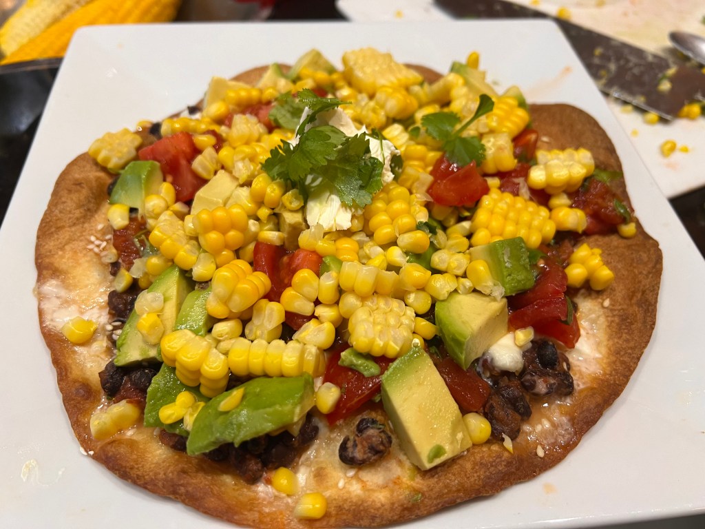 Nachos with sweetcorn, cheese, beans and tomato&nbsp;salsa