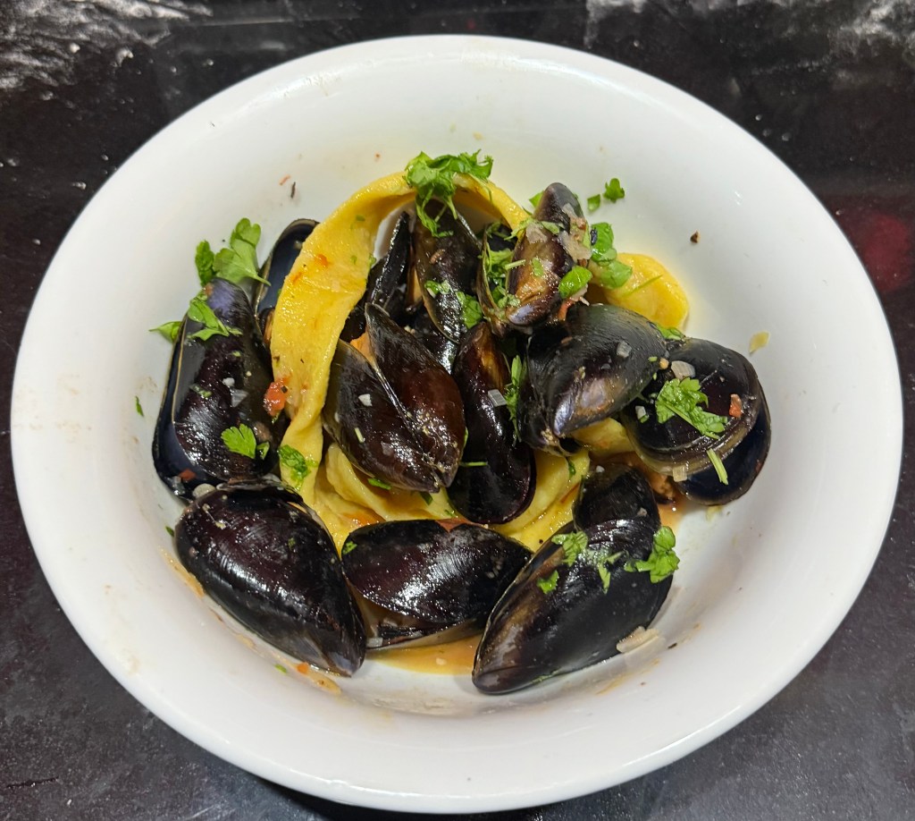 Mussels with saffron pici 