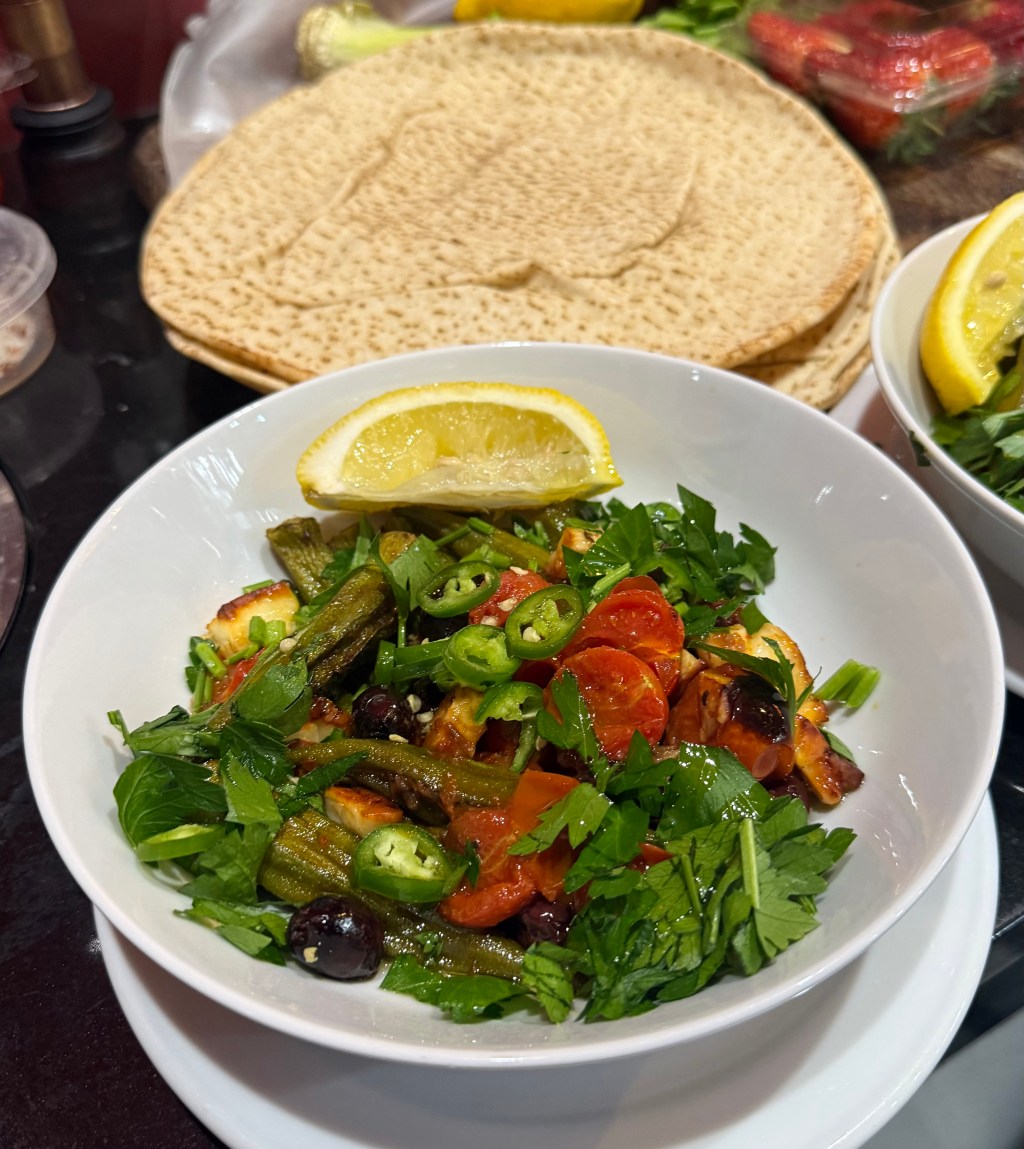 Pan-fried okra with tomato, olives and haloumi (Bamia bil&nbsp;siniyhe)