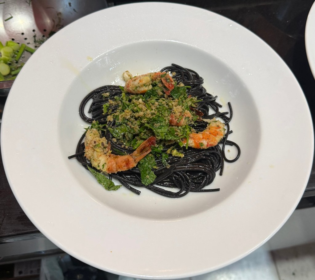 Squid-ink pasta with poached&nbsp;prawns