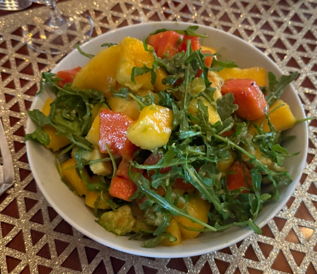 Salad of paw paw, mango and rocket