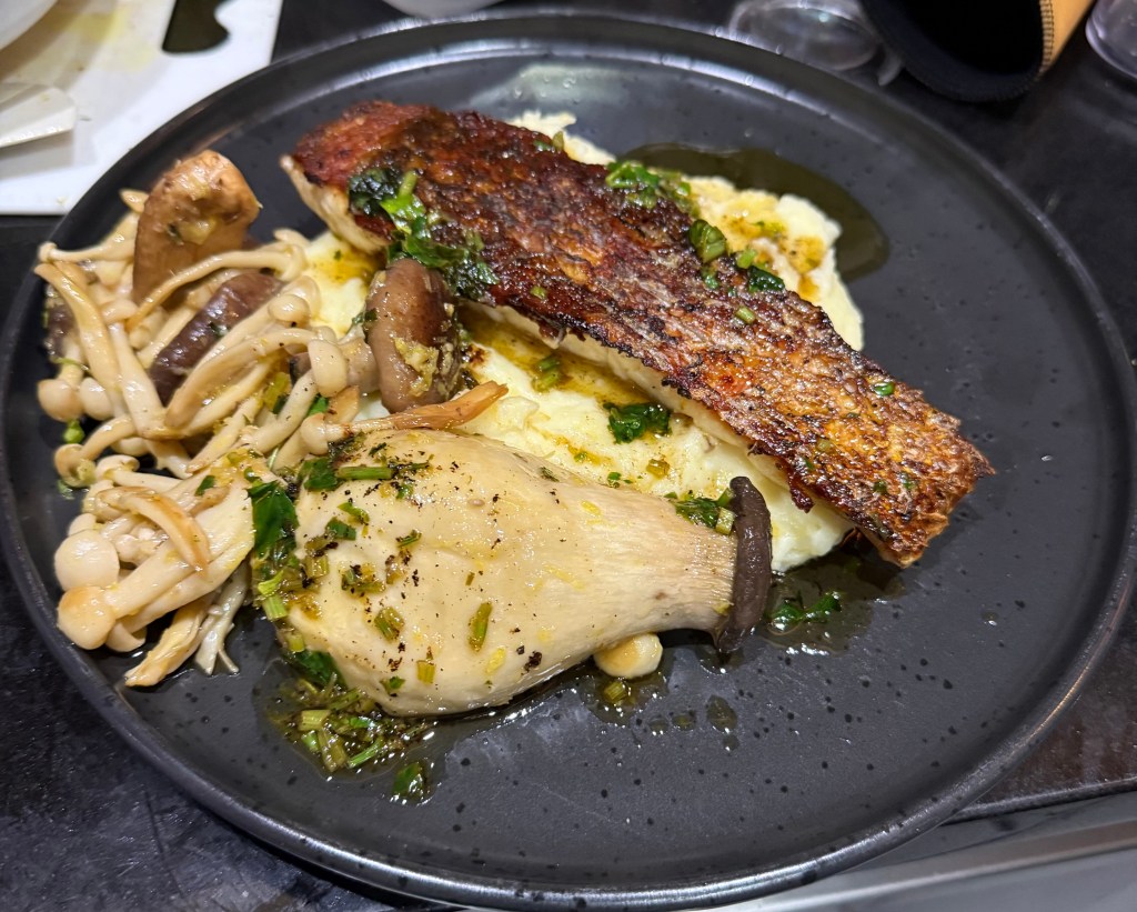 Crispy skin Humpty Doo Barramundi with garlic mushrooms and creamy mash